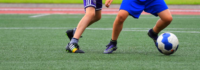 Beine und Fußball