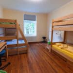 Gemütliches Mehrbettzimmer im Inspektorenhaus Stuer