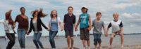 Gruppenfoto vor See