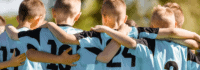 Gruppenfoto einer Fußballmannschaft von hinten