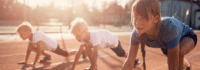 Kinder sind in Startposition zum Sprint